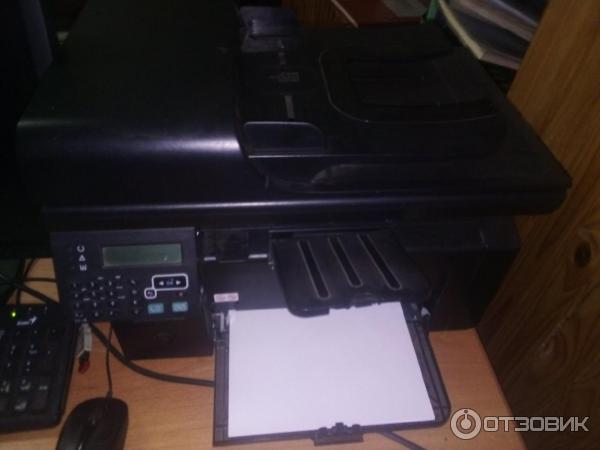 Лазерное МФУ HP LaserJet M1212nf MFP фото