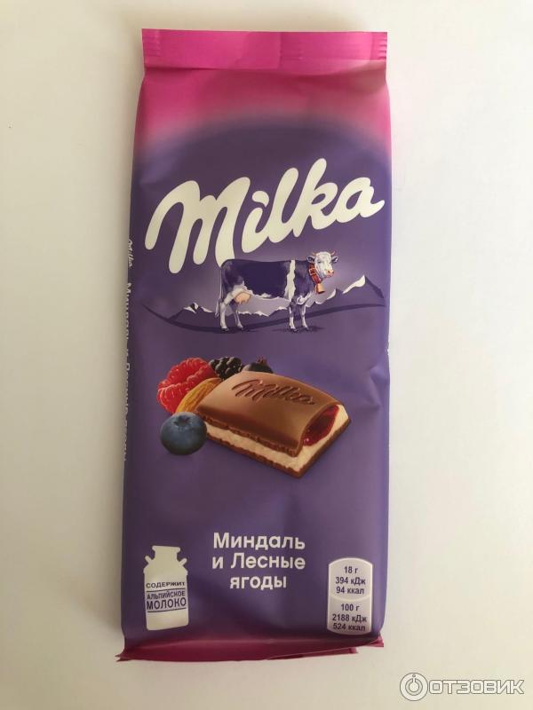 Шоколад Milka миндаль и цветные ягоды фото