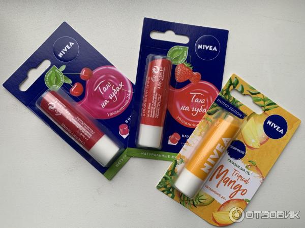 Бальзам для губ Nivea Клубничное сияние, Вишневое сияние, Тропическое манго фото