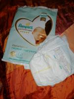 Детские подгузники Pampers Premium Care фото