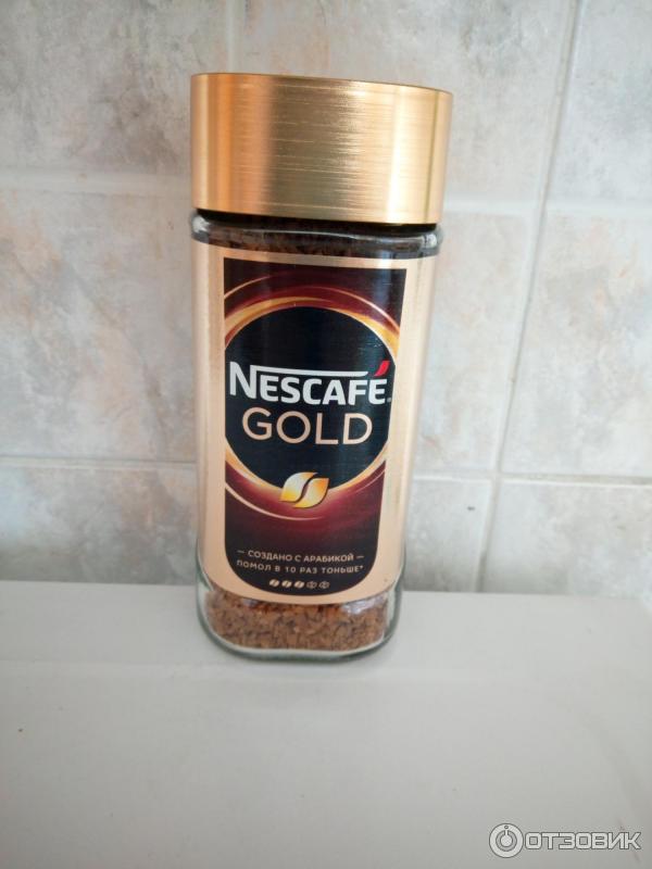 Молотый кофе в растворимом Nescafe Gold фото