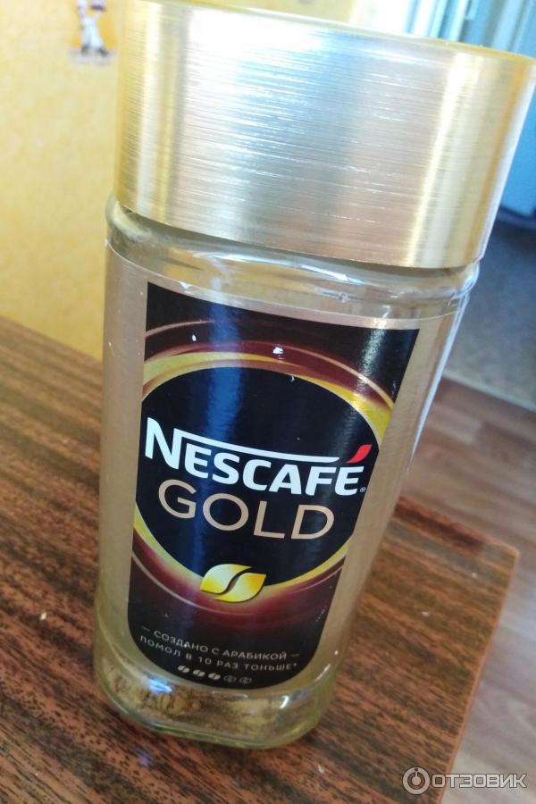 Молотый кофе в растворимом Nescafe Gold фото