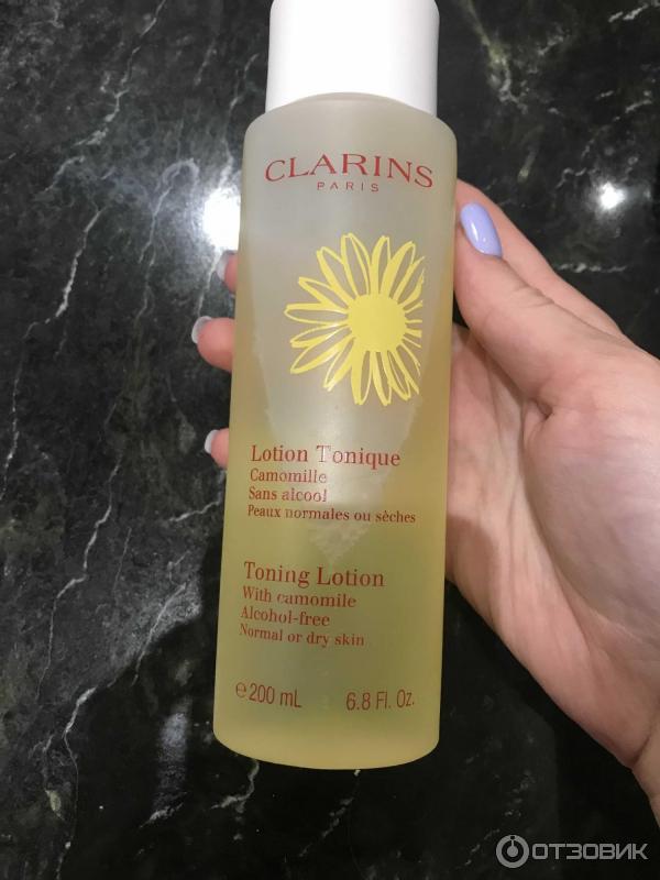 Тонизирующий лосьон Clarins с ромашкой для сухой и нормальной кожи фото