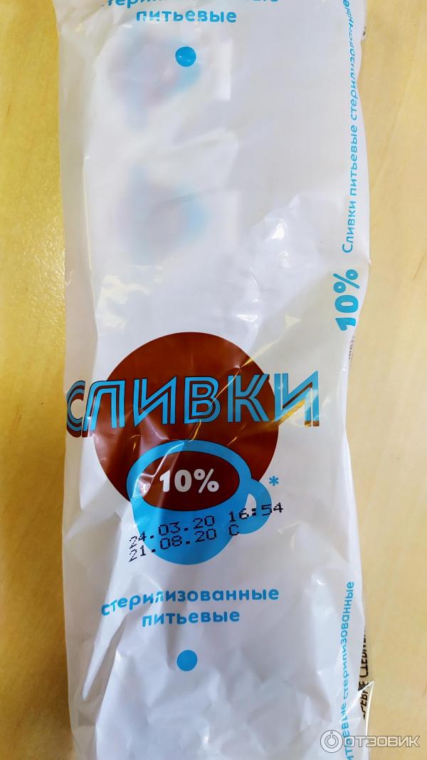 Сливки порционные Campina 10% фото