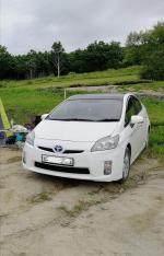 Автомобиль Toyota Prius - хэтчбек фото
