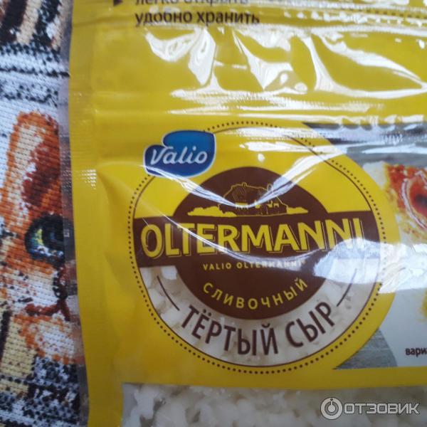 Сыр тертый сливочный Valio Oltermanni фото