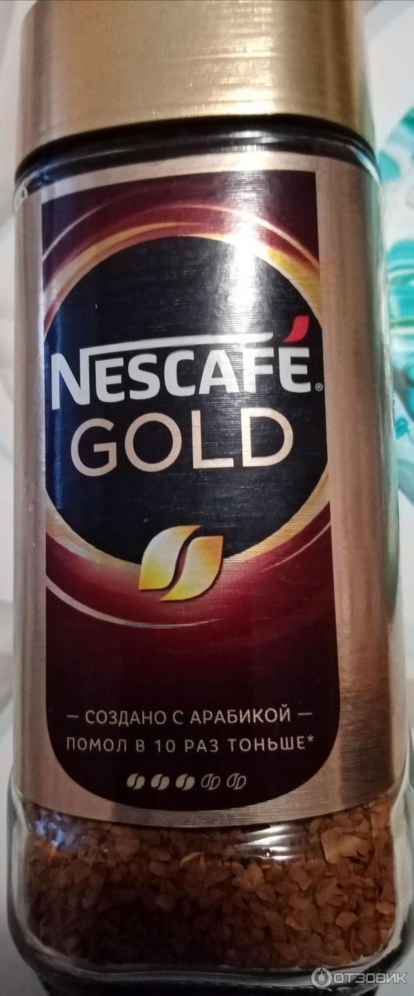 Молотый кофе в растворимом Nescafe Gold фото